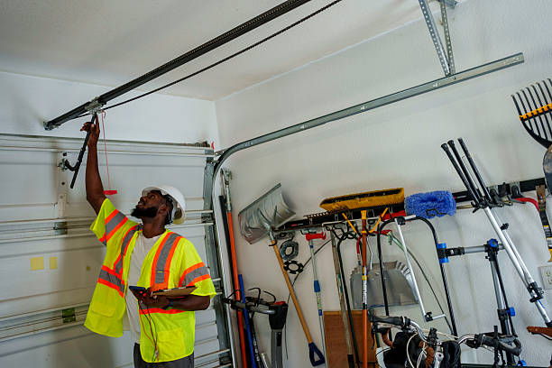 Professional Garage Door technician working in Mount Rainier, MD